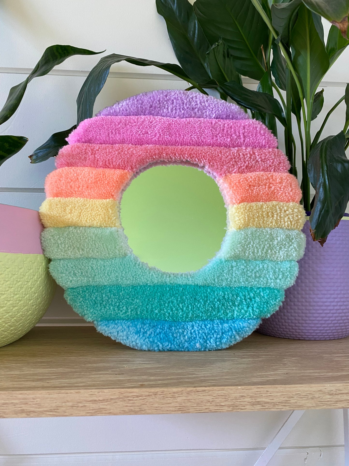 Cute pastel fluffy mirror with 3D stripes.