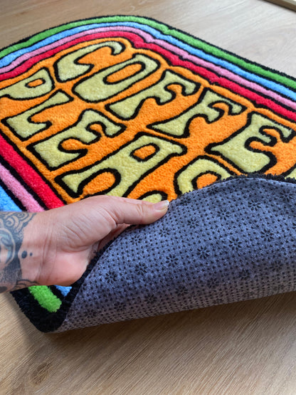 Coffee please! Colourful rippled rug.