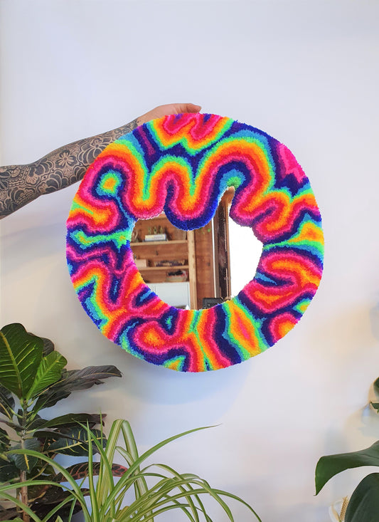 Psychedelic round rainbow swirl mirror with mint accent