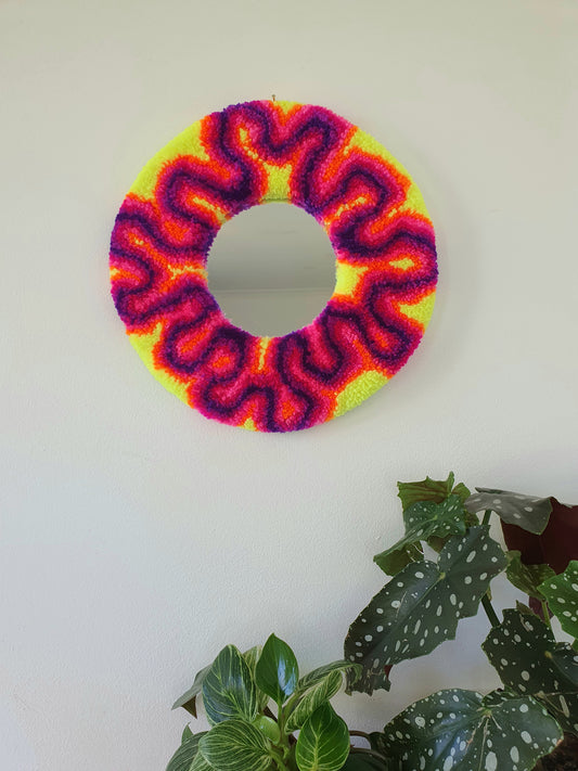 Miniature round mirror in neon