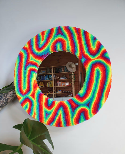 Psychedelic colourful swirl mirror