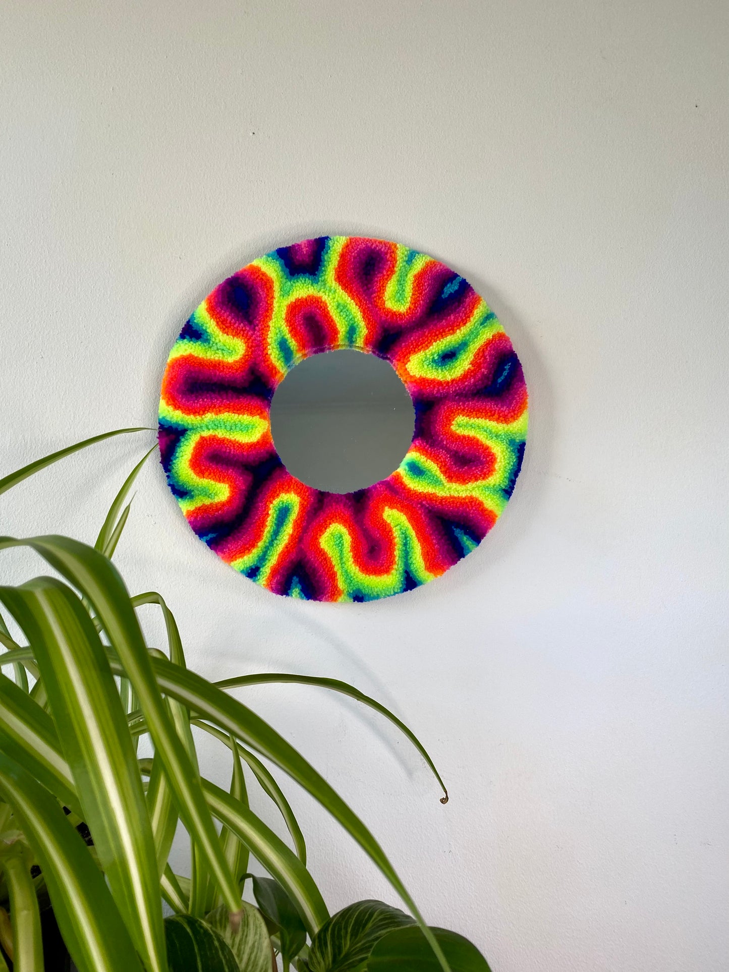 Miniature round mirror in rainbow swirl