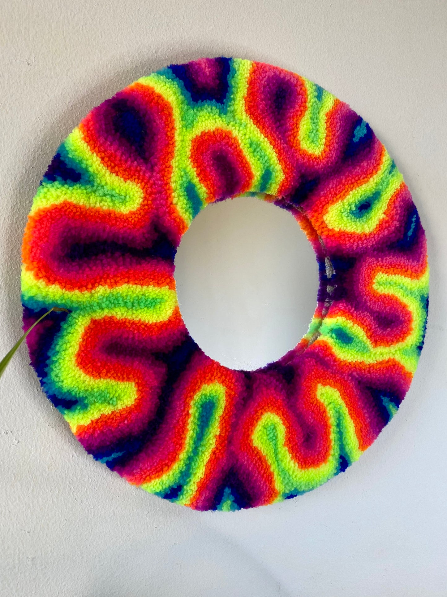 Miniature round mirror in rainbow swirl