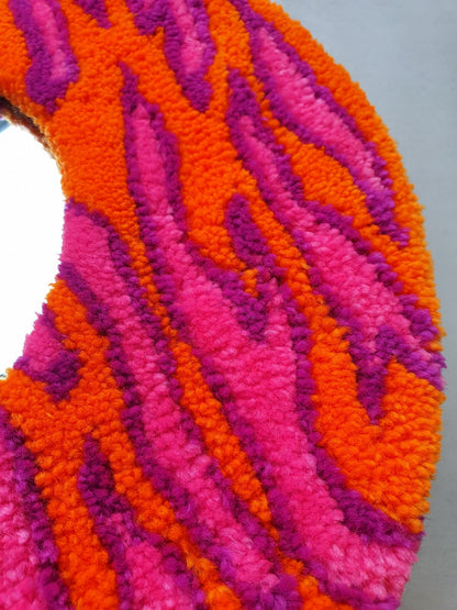 Zebra stripe mirror in orange and pink