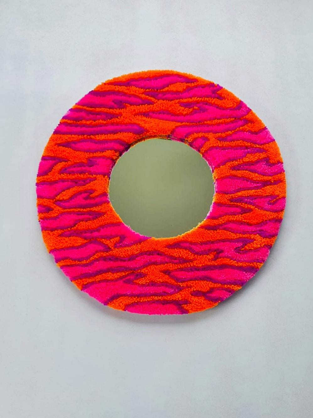 Zebra stripe mirror in orange and pink